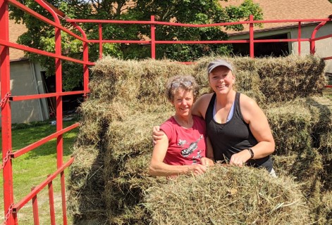 Helping on Paul and Katie Martinkas farm with Arielle